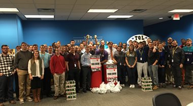 People posed with presents