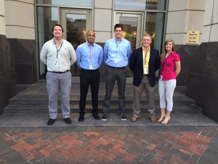 People standing in front of office building