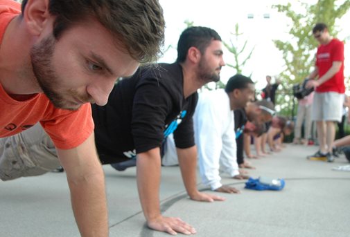 Group of people doing push ups