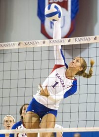 Female Volleyball player spiking ball