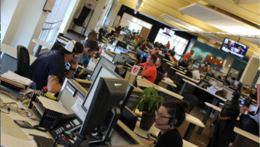 TQL Employees Hard At Work In Their Desks On Their Floor