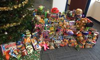 Many Wrapped Presents In Front Of A Christmas Tree